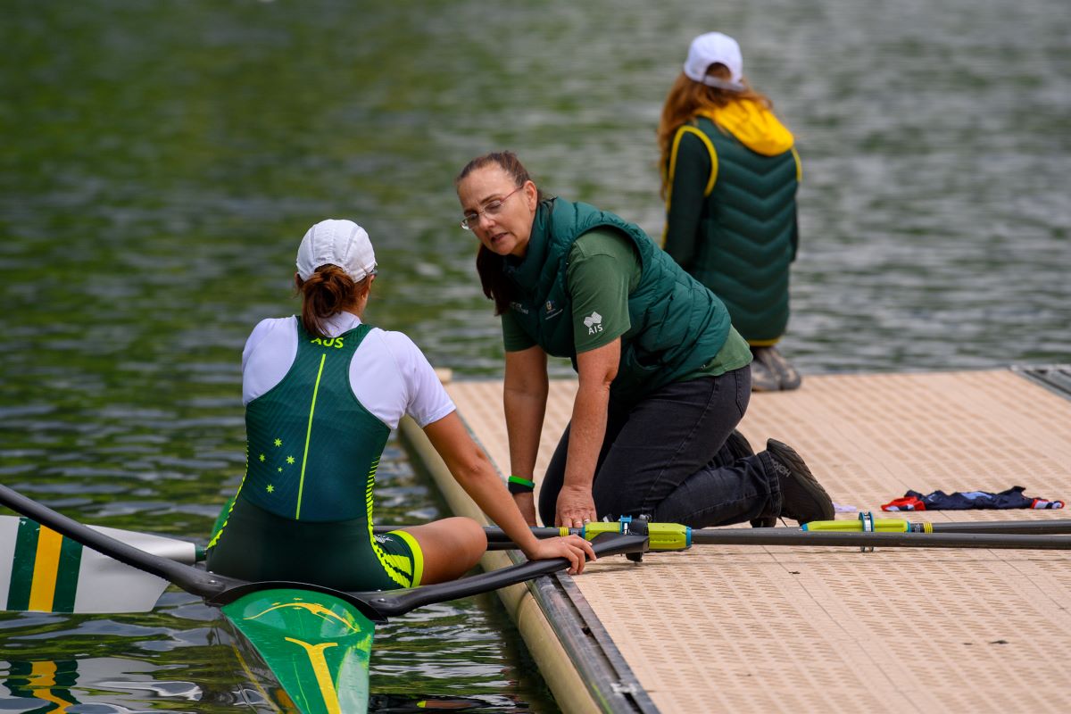 Rowing Coach instructing an athlete