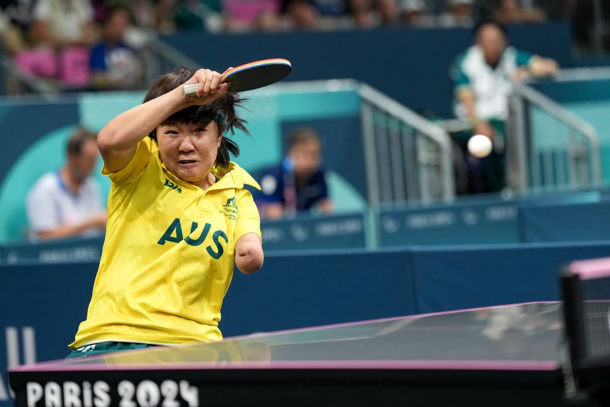 Paralympian Qian Yang playing table tennis at the 2024 Paralympics in Paris