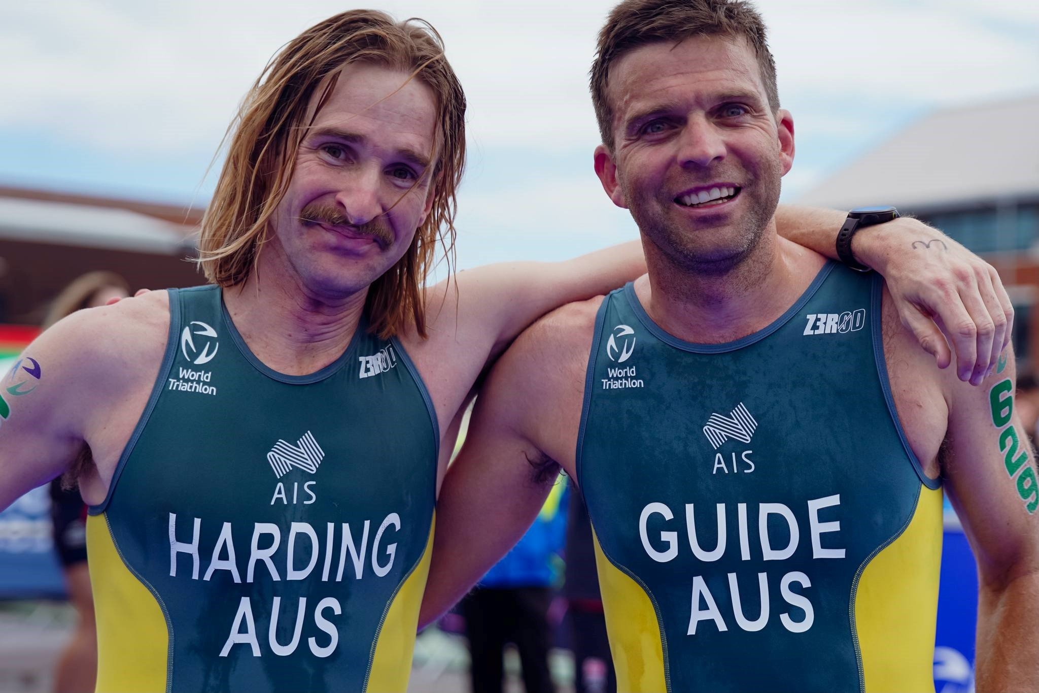 Sam Harding (PTVI) and guide Aaron Royle after securing the bronze medal at the World Triathlon Para Series Swansea