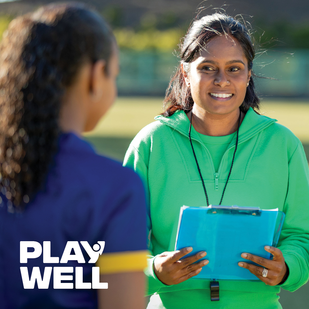 Female coach on a sport field